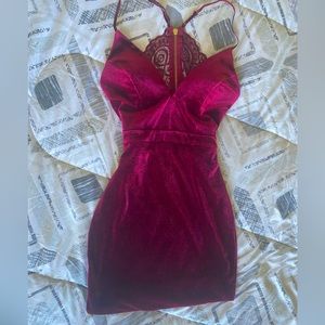 This is a burgundy mini dress,has adjustable straps,size XS,has lace on back